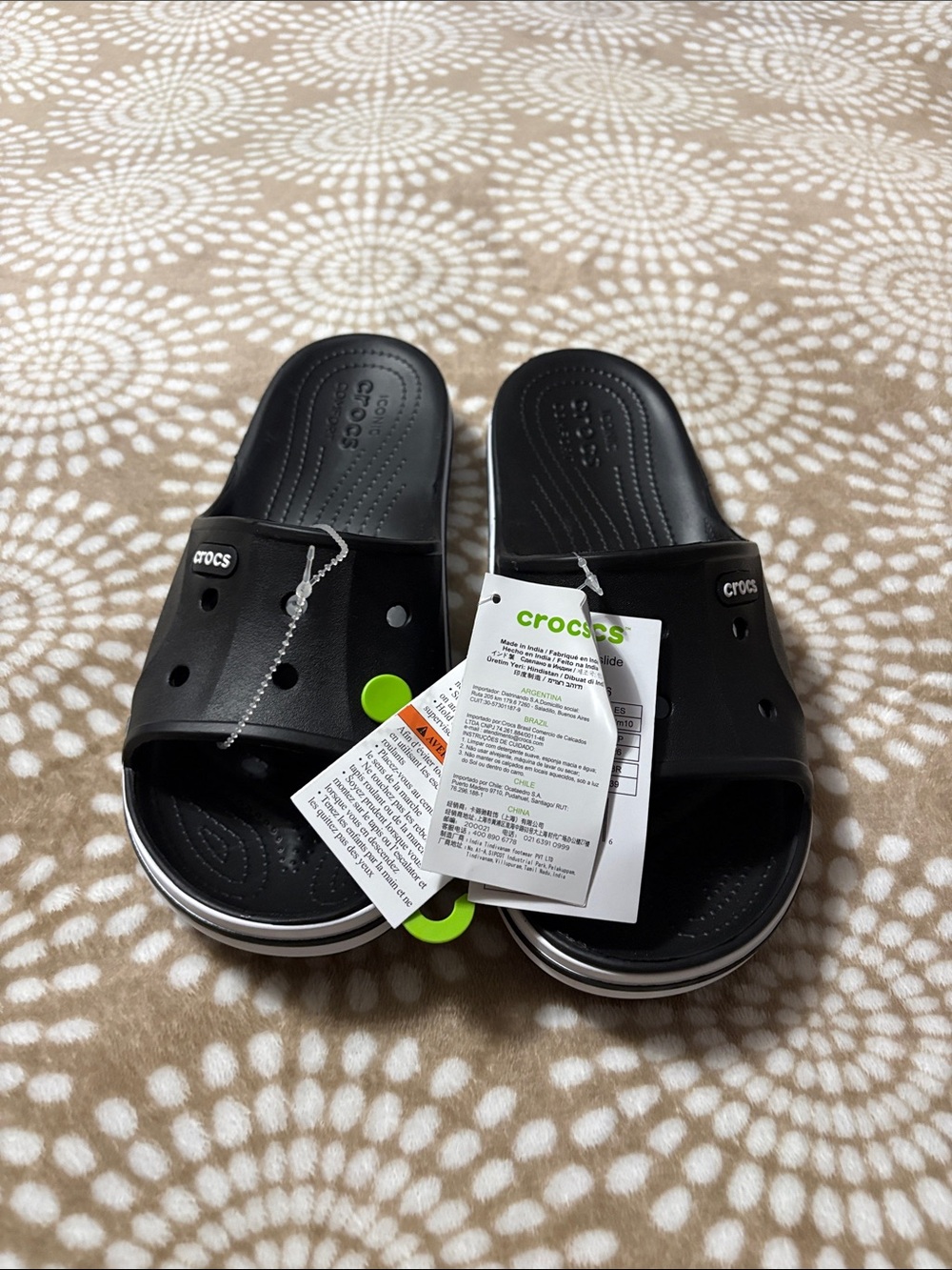 CROCS Black Slide Sandals with White Trim